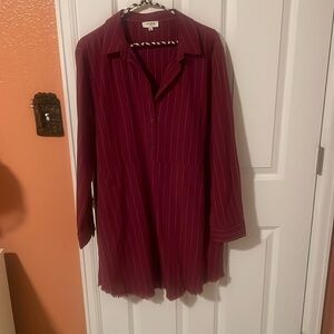Maroon tunic top with pockets. Light white stripes. Long sleeves